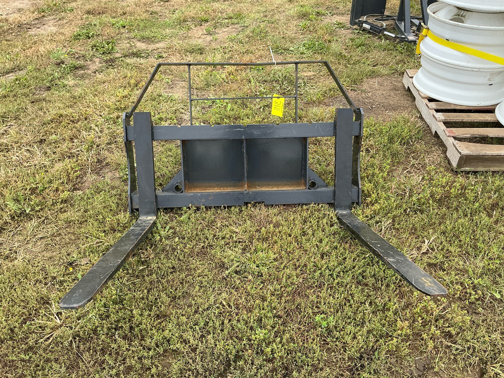 Mini skid steer fork attachment