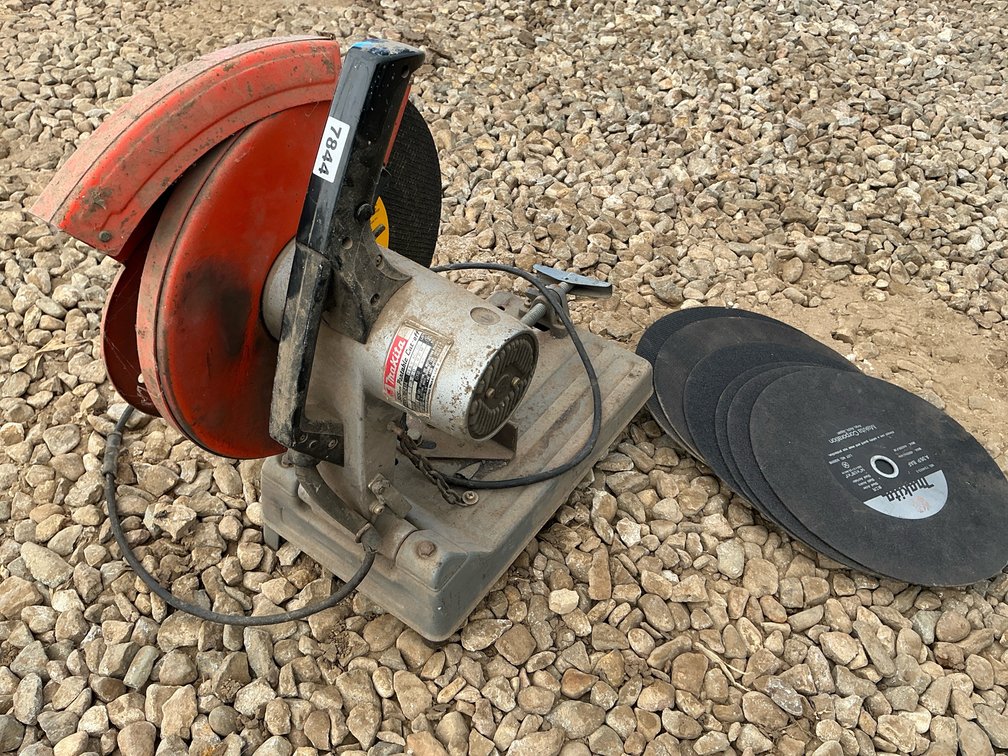 Makita chop saw with 6 new blades