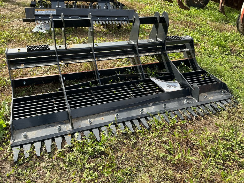 Landleveler skid steer attachment