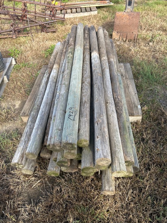 (34) wood posts, 3-4" x 7', pointed