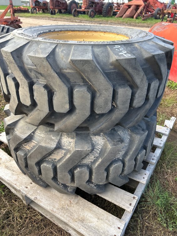 (2) 14-17.5  skid steer tires & rims