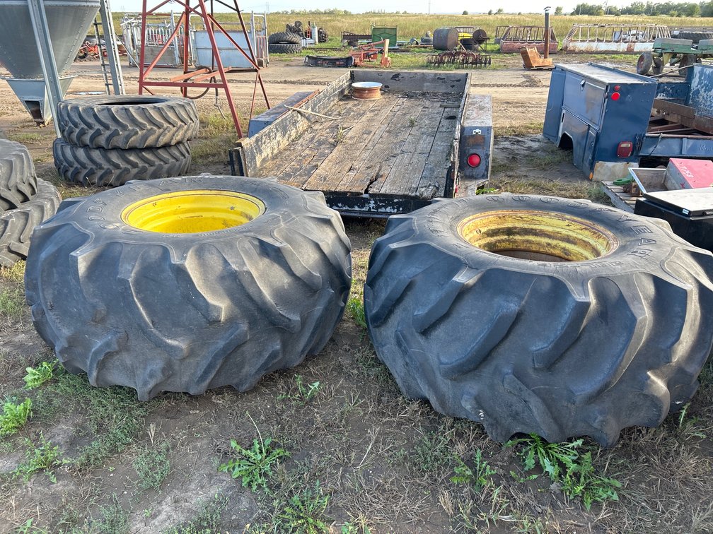 (2) Goodyear 28L-26 tires with rims