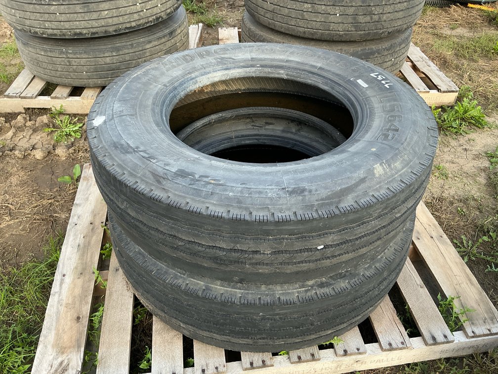 (2) 295/75R22.5 tires