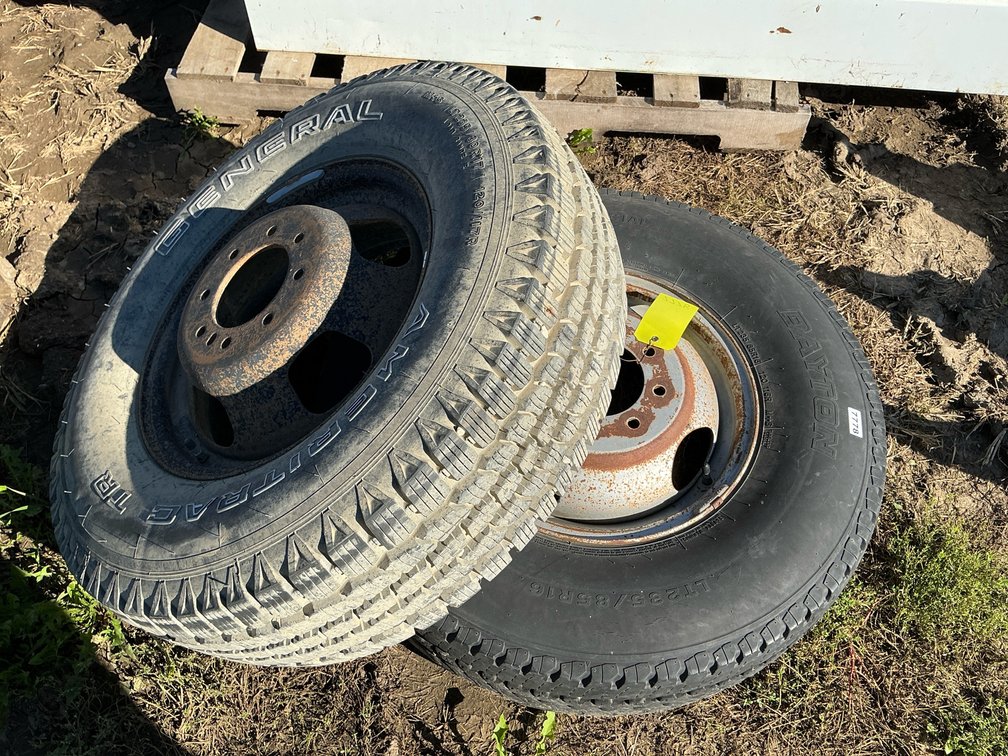 (1)235/85R16 tire on rim and (1) 235/80R17 tire on rim