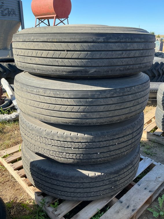 (4) 11R225 tires on aluminum rims