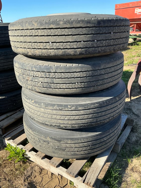 (4) 11R225 tires on aluminum rims