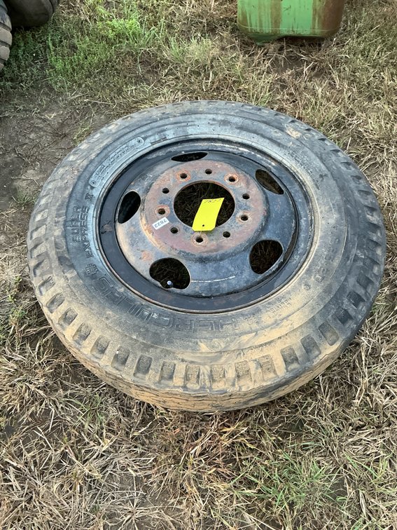 (1) 8.25-20 tire with rim