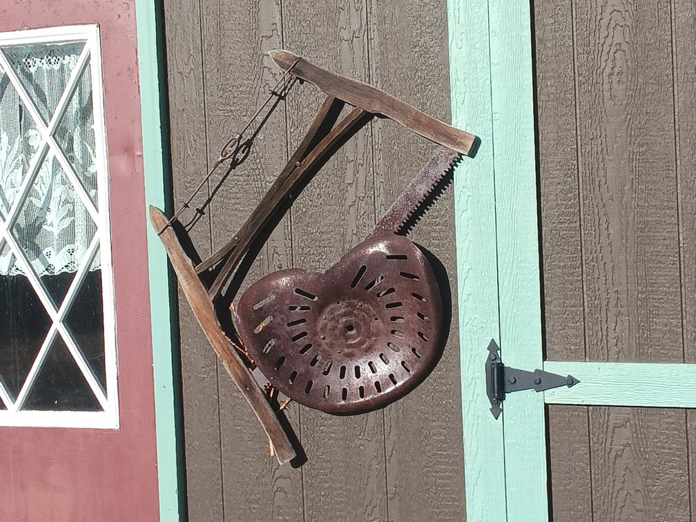 Antique Farm Equipment – Cast Iron Tractor Seat, Wooden Frame & Saw Blade