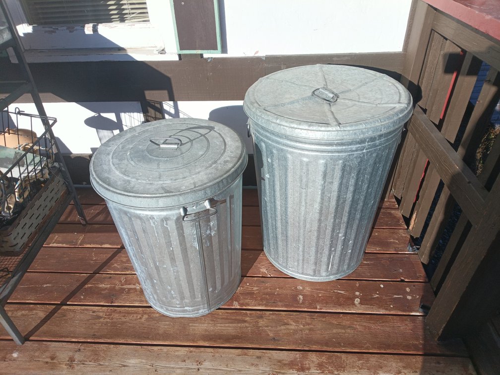 Two Galvanized Trash Cans