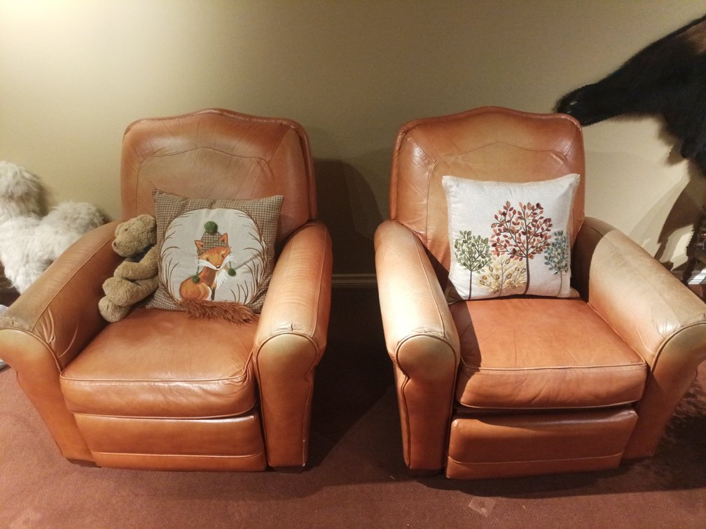 Pair of La-Z-Boy Orange Leather Recliners with Throw Pillows & Wicker Basket