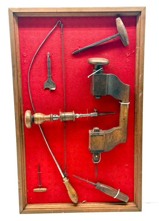Framed Group of Early Tools
