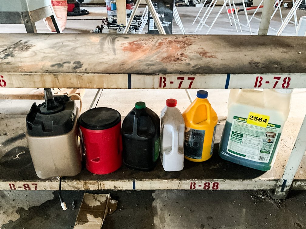 Content Of Bottom Shelf - Round Up, Bar Oil, Misc. Paint