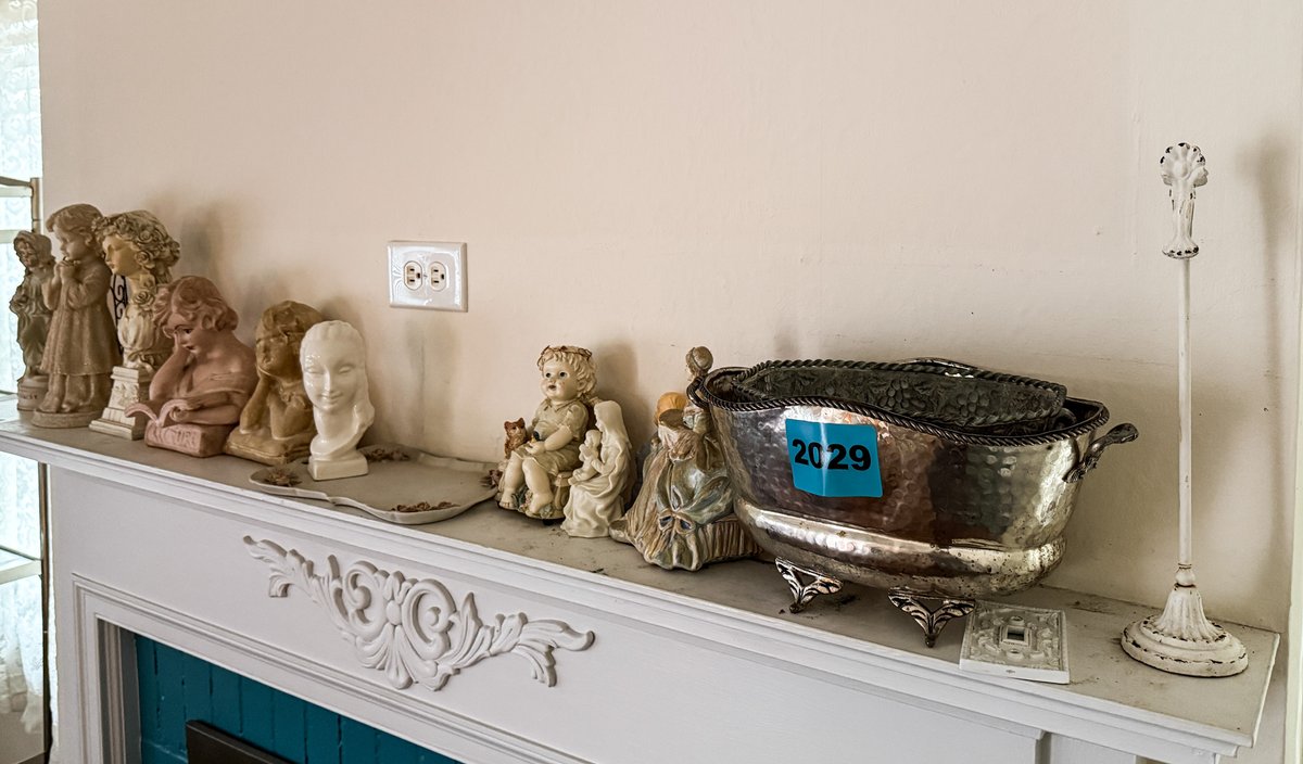 Figurines On Fire Place Mantal 