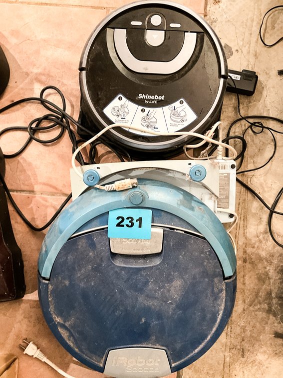 2 Automated Vaccum Cleaners W/ Charging Stations