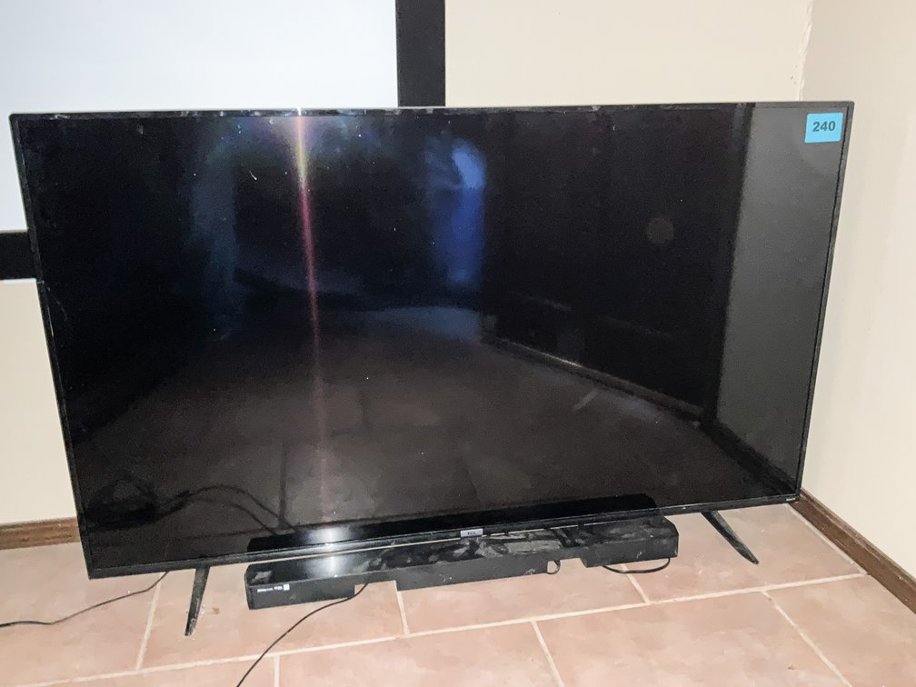 TCL Flat Screen 57" Roku TV Model X655433 W/ Samsung Soundbar