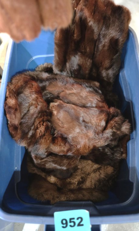 Tote With Assorted Fur Wraps and Stoles