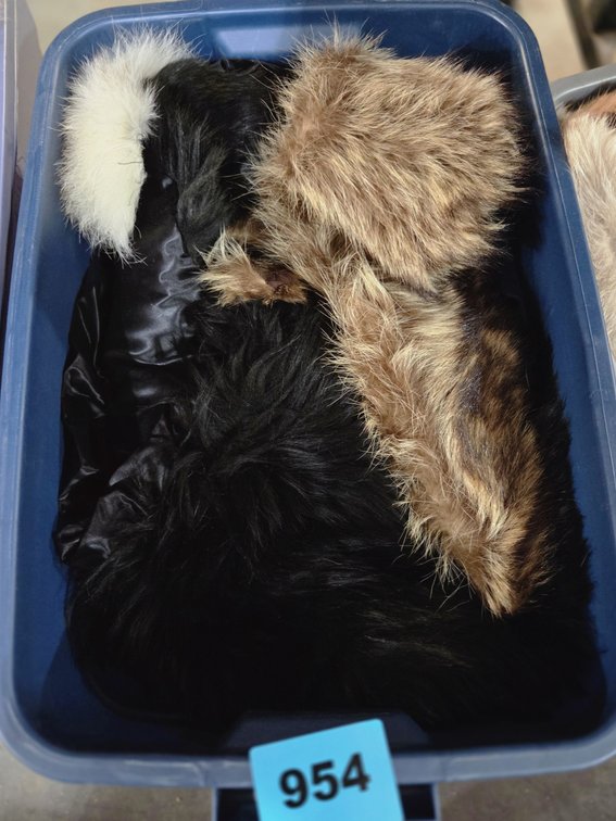Tote With Assorted Fur Wraps and Stoles