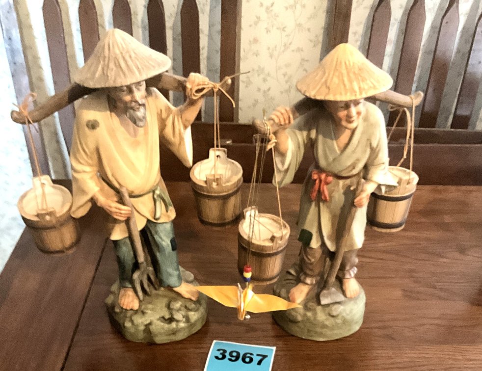 2 Japanese Workers Carrying Water