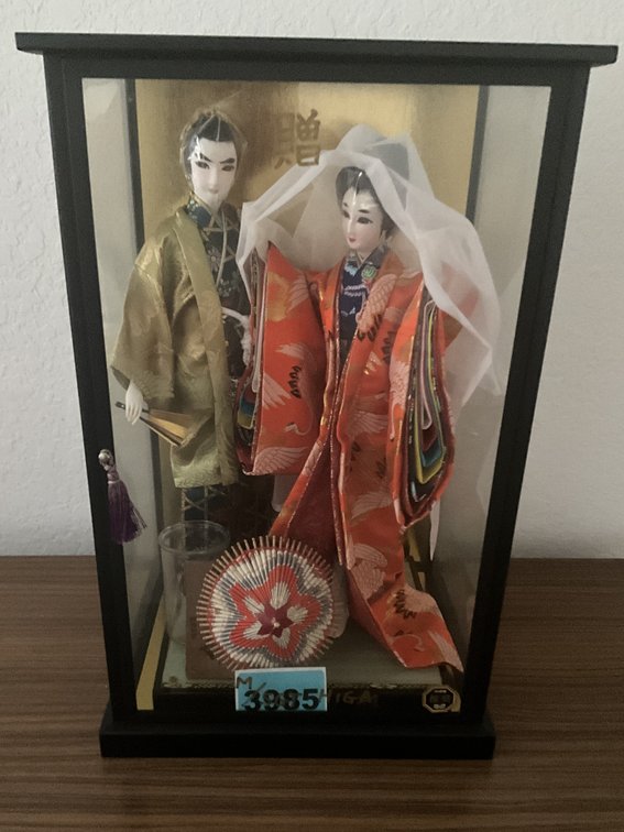 Japanese Couple Behind Glass