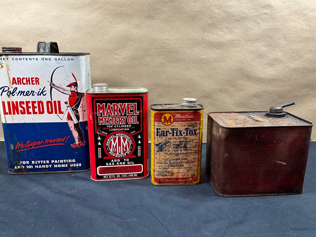 4 Assorted Fluid Cans: Archer Linseed Oil, Marvel Mystery Oil, Martin's Ear-Tix-Tox, DelavaeOil