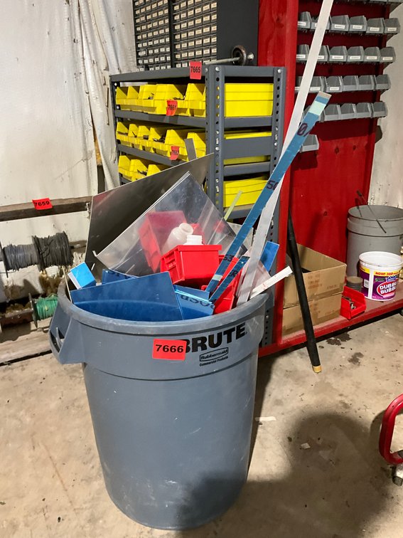 Brute Waste Can Full of Aluminum Sheet Cutoffs