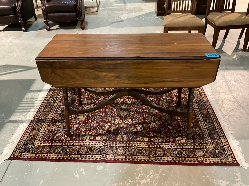Antique Drop-Leaf Table With Patterened Area Rug