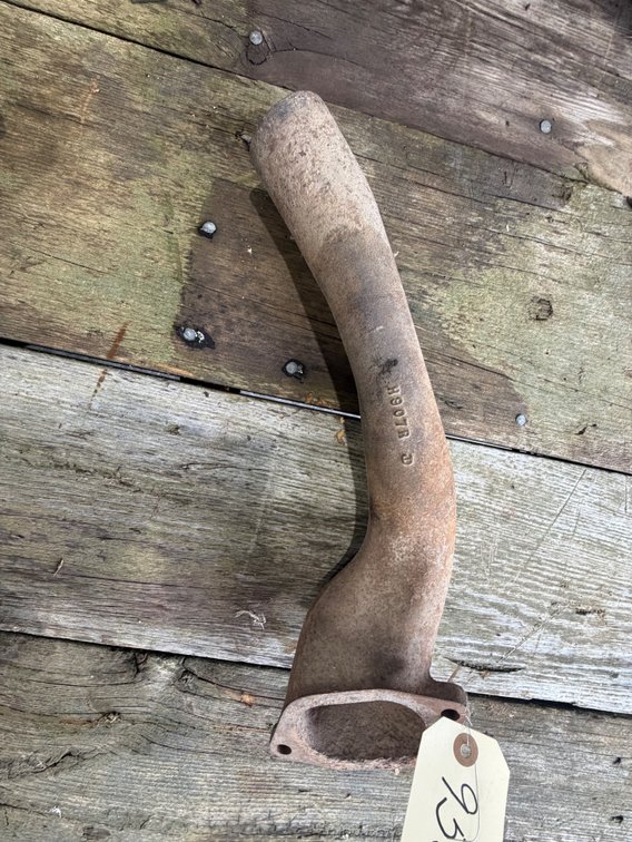 John Deere H Cast-Iron Exhaust or Water Pipe - Location: Joel's Tractors and Auction, LLC - Strawberry Point, IA
