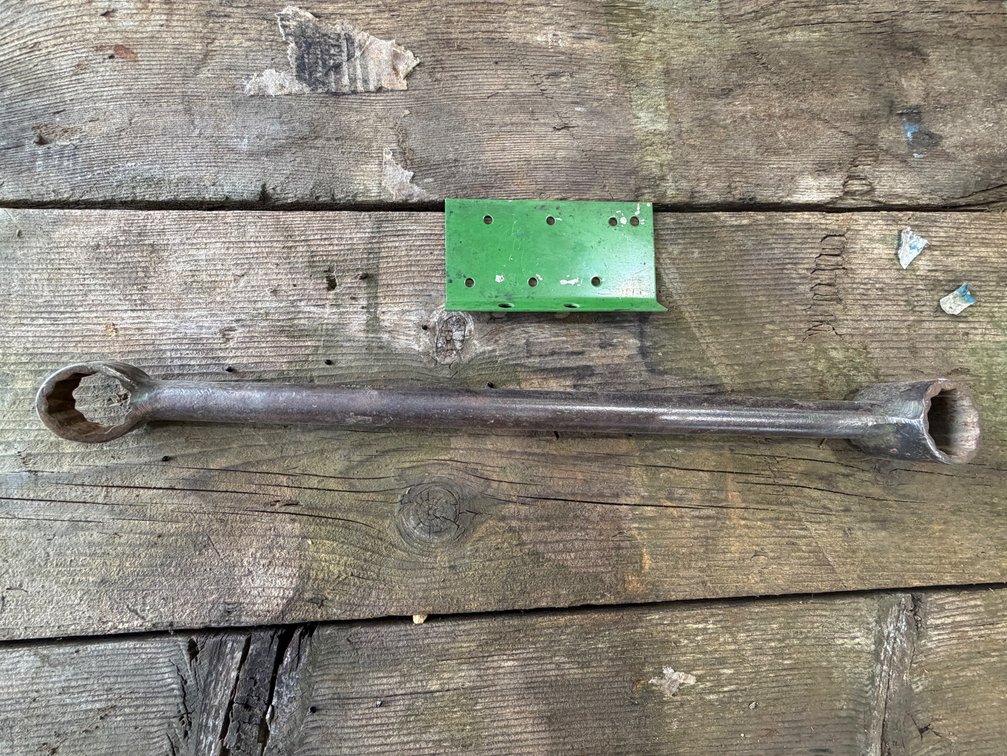 Original John Deere A-B-50-60-70 Wheel Wrench and 24-volt 4010-4020 Solenoid Shield - Location: Joel's Tractors and Auction - Strawberry Point, Iowa