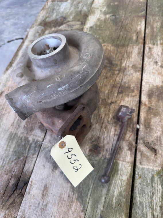 John Deere Schwitzer Engine Turbo and John Deere Throttle Lever - Location: Joel's Tractors and Auction, LLC - Strawberry Point, IA