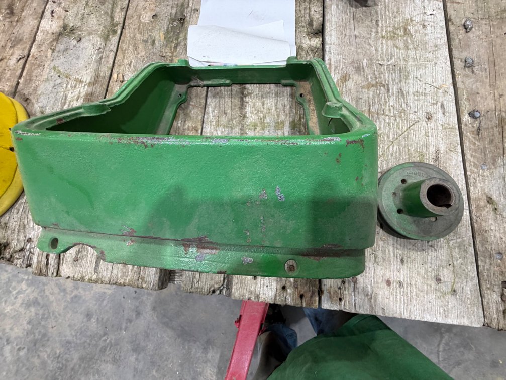 Original John Deere 1010 Tractor Gauge Tach Casting & 1010 Crankshaft Pulley - Location: Joel's Tractors and Auction, LLC - Strawberry Point, IA