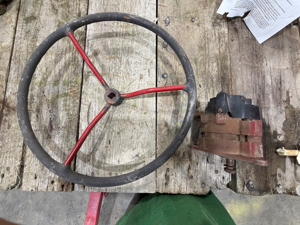Farmall M-H Tractor Steering Wheel & Used Lucas Alternator - Location: Joel's Tractors & Auction - Strawberry Pt, IA.