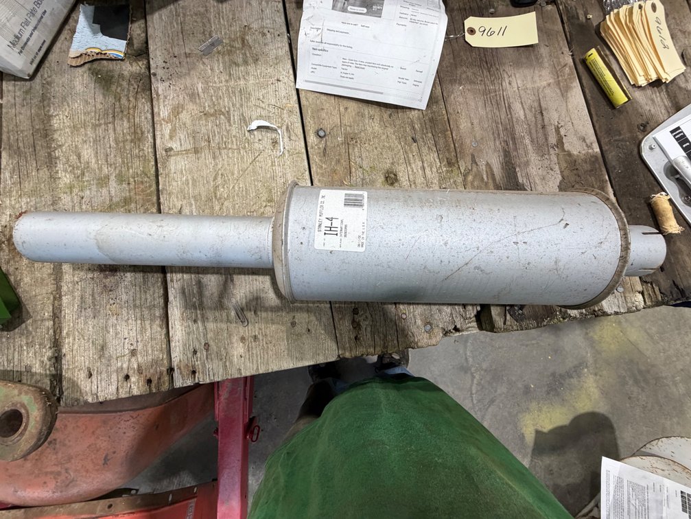 New Old Stock Stanley Muffler for Farmall H-SH-W4 -Location: Joel's Tractors & Auction - Strawberry Pt, IA.