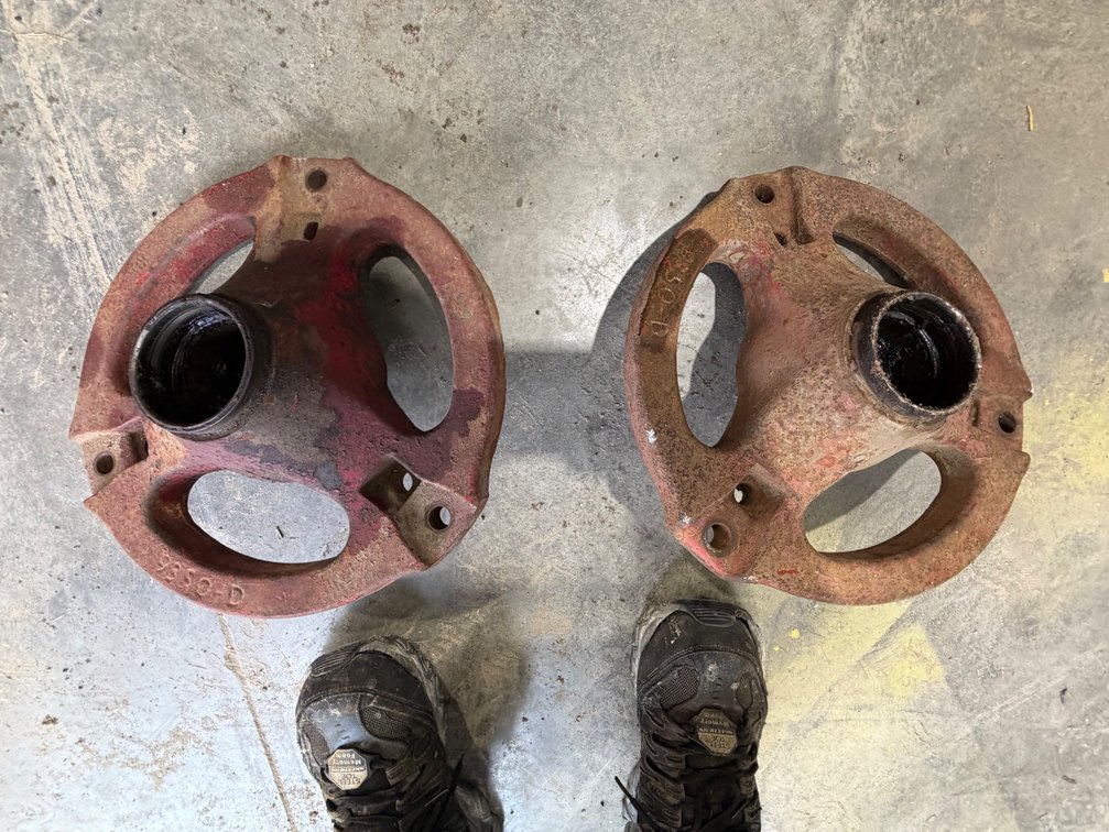 Farmall C? Front Wheel Hubs - Location: Joel's Tractors & Auction -  Strawberry Pt, IA.