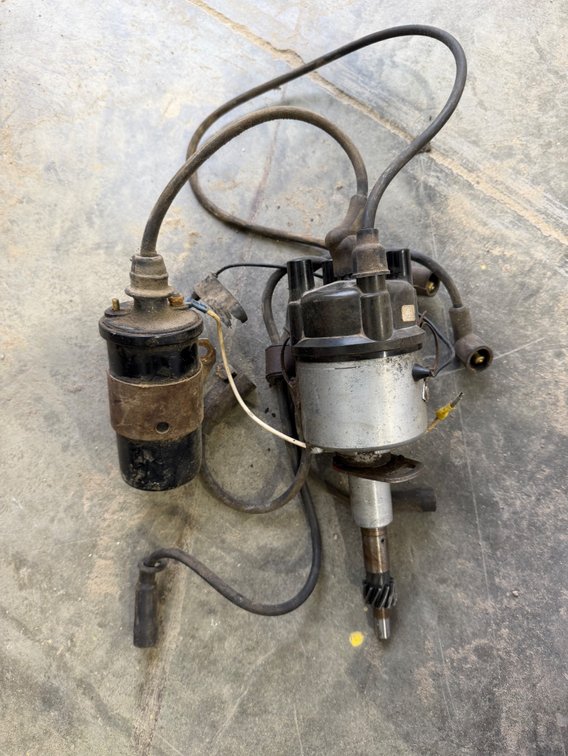 Ford 8N Side-Mount Distributor and Coil - Location: Joel's Tractors & Auction - Strawberry Pt, IA.