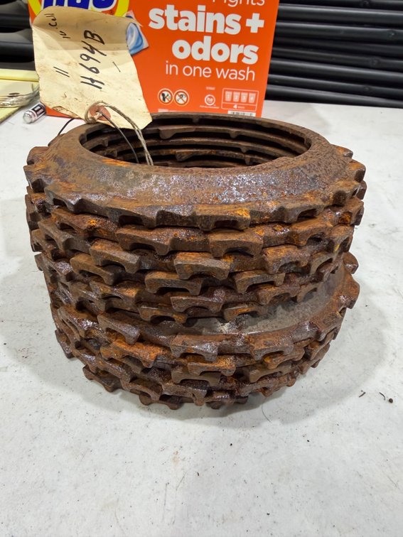 12 Cast-Iron Seed Planter Plates - Item Location: Joel's Tractors & Auction -  Strawberry Pt, IA