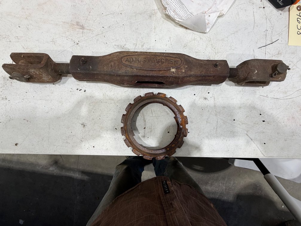 2 Cast-iron Seed Planter Plates and Old Tractor 3-Pt. Adjustascrew Center Link-Location: Joel's Tractors & Auction - Strawberry Pt, IA