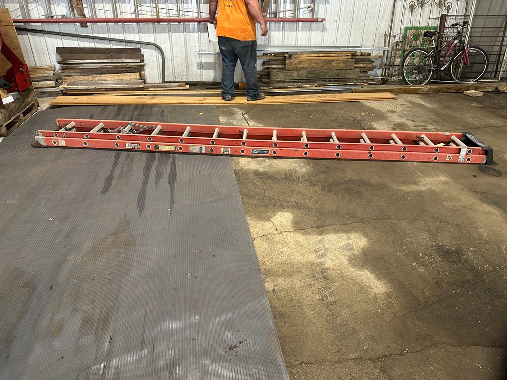 28' Louisville Fiberglass Extension Ladder - Item Location: Machine Shed – 7826 E Ave, Arlington, Iowa 50606