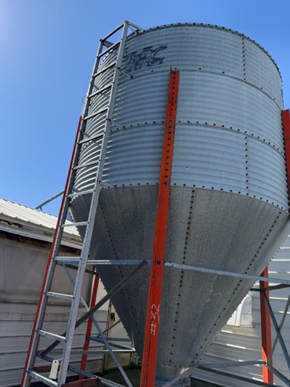 Bulk Feed Bin with Cone Bottom, Ladder & Support Stand - Item Location: Outside – 7826 E Ave, Arlington, Iowa 50606
