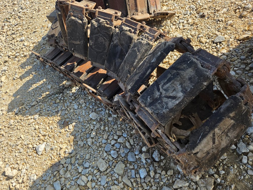 McLaren over tire skidloader tracks.