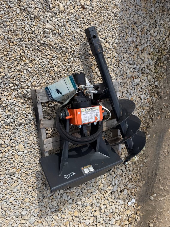 Wolverine mini skid post hole digger