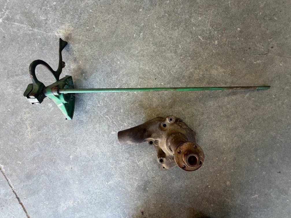 Oliver 77-88 Throttle Lever & 88, S88 & 770 Water Pump - Item Location: Joel's Tractors and Auction, LLC-33587 Hwy. 13 -Strawberry Point - IA - 52076