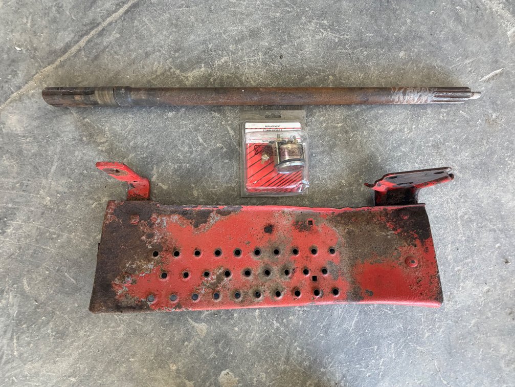 Ford RH Running Board and PTO Shaft and Temp Gauge - Item Location: Joel's Tractors and Auction, LLC-33587 Hwy. 13 -Strawberry Point - IA - 52076
