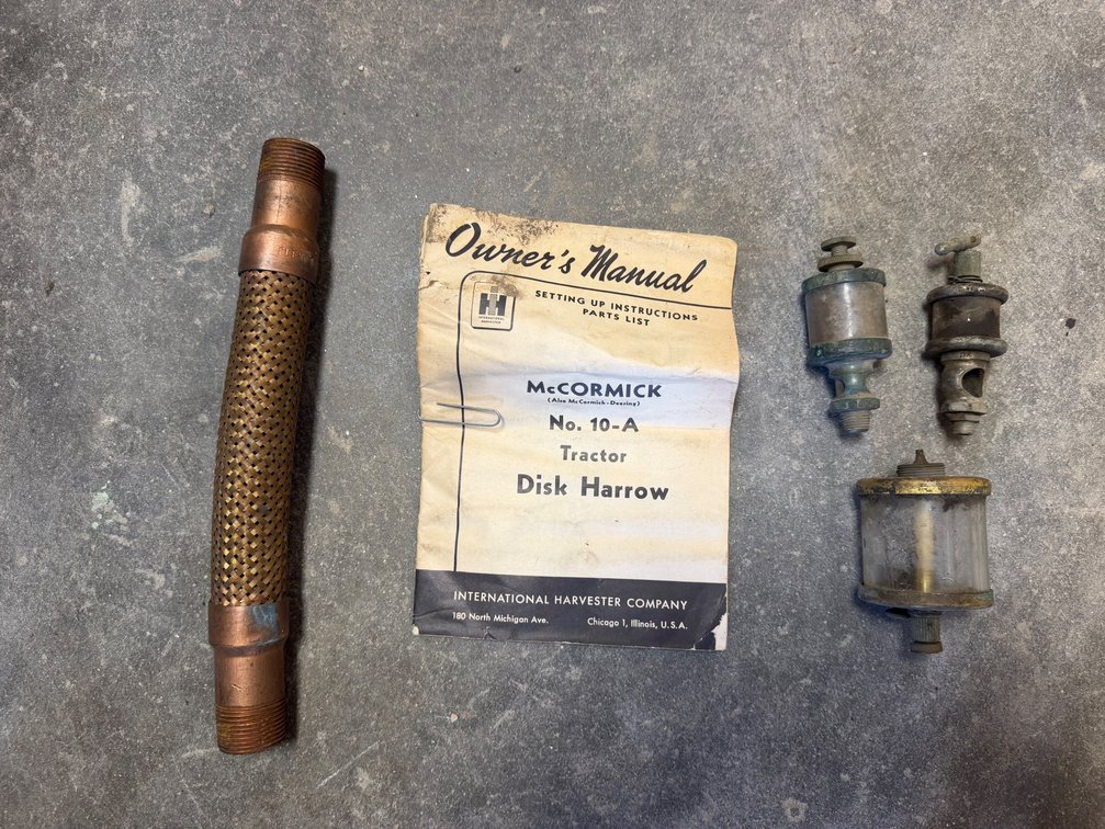 NOS Gas Engine Exhaust Copper Tube & McCormick Tractor 10-A Disk Manual & Oilers for Hit-N-Miss Engines - Item Location: Joel's Tractors and Auction, LLC-33587 Hwy. 13 -Strawberry Point - IA - 52076