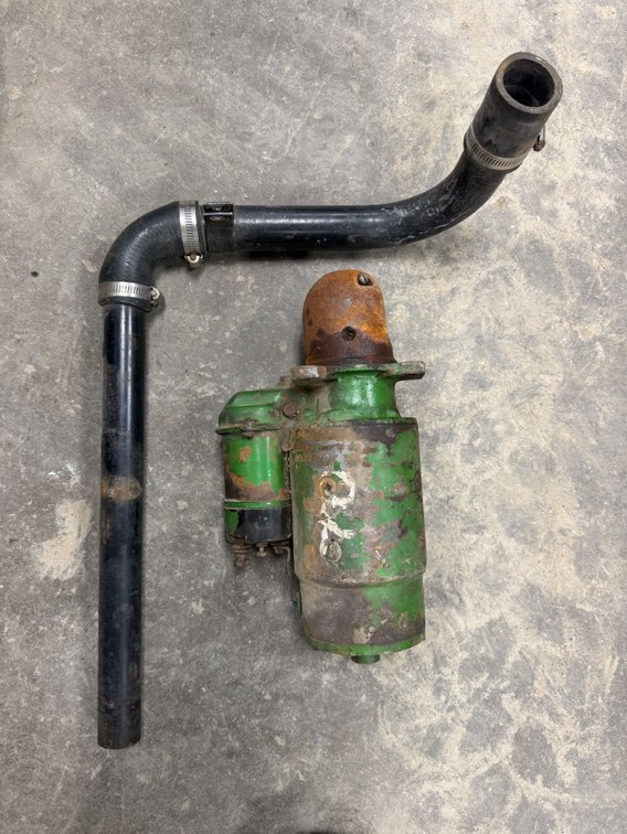John Deere 3010-3020,4000,4010,4020 Gas 12-Volt starter and John Deere 10 and 20 Series Carburetor-to-Air Cleaner Pipe - Item Location: Joel's Tractors and Auction, LLC-33587 Hwy. 13 -Strawberry Point - IA - 52076