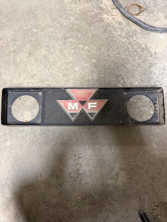 Massey Ferguson Front Lower Grill/Headlight Panel with Massey Ferguson Emblem - Item Location: Joel's Tractors and Auction, LLC-33587 Hwy. 13 -Strawberry Point - IA - 52076