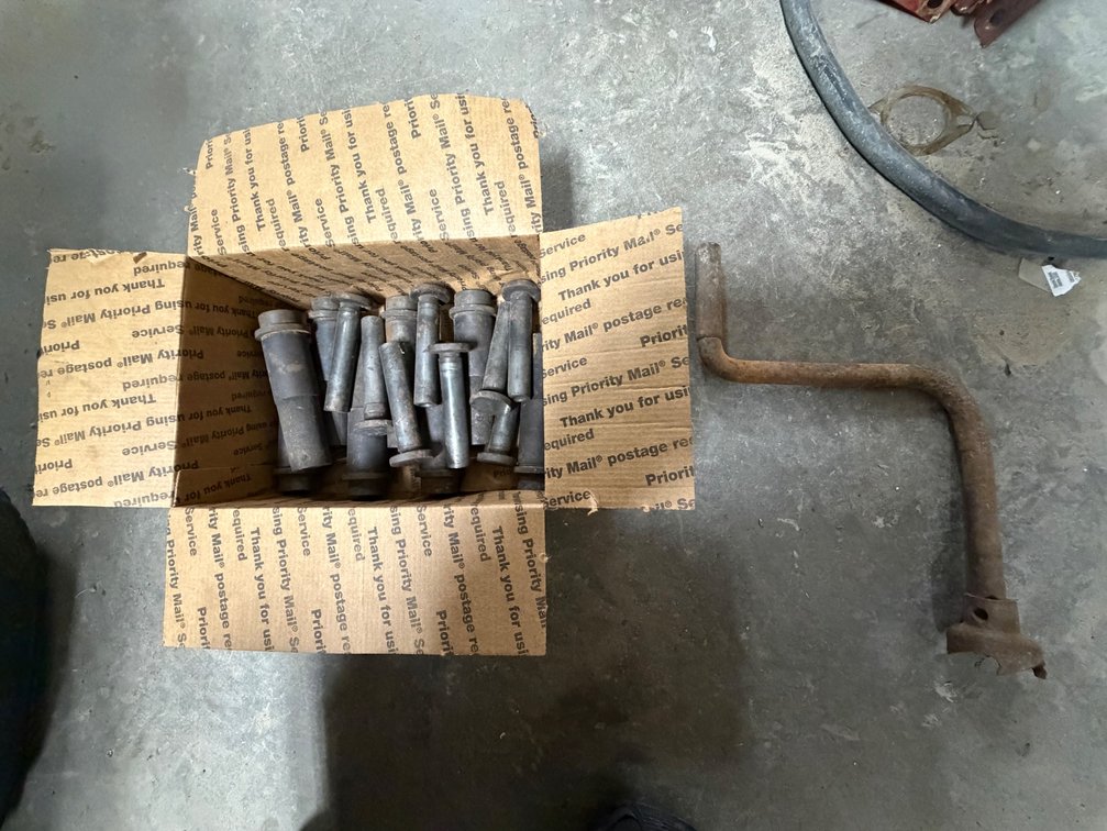 McCormick-Deering 15-30 Tractor Engine Lifters/Push Rods and Old Farmall 10-20 Tractor Hand Crank - Item Location: Joel's Tractors and Auction, LLC-33587 Hwy. 13 -Strawberry Point - IA - 52076