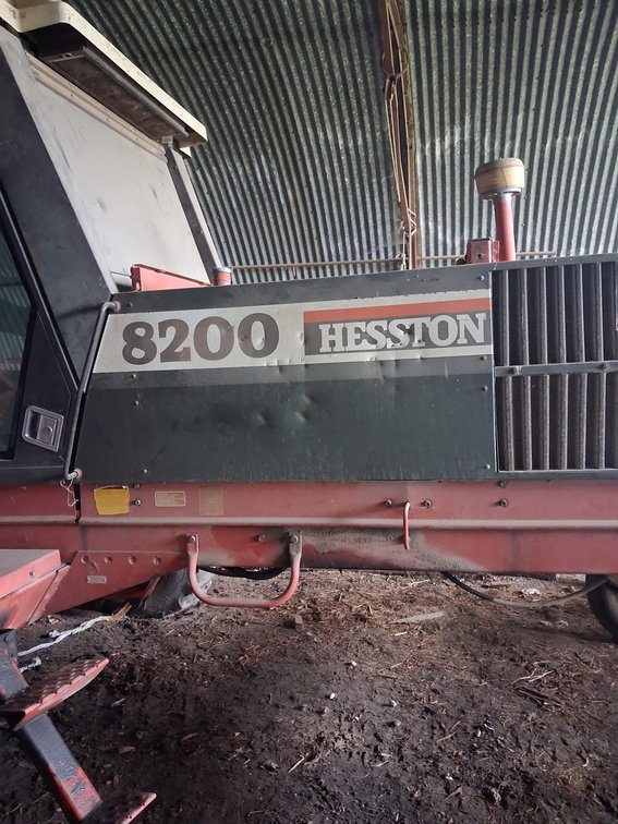 Hesston 8200 Self-Propelled Windrower with Header - Item Location: Waukon, Iowa (More info to come)