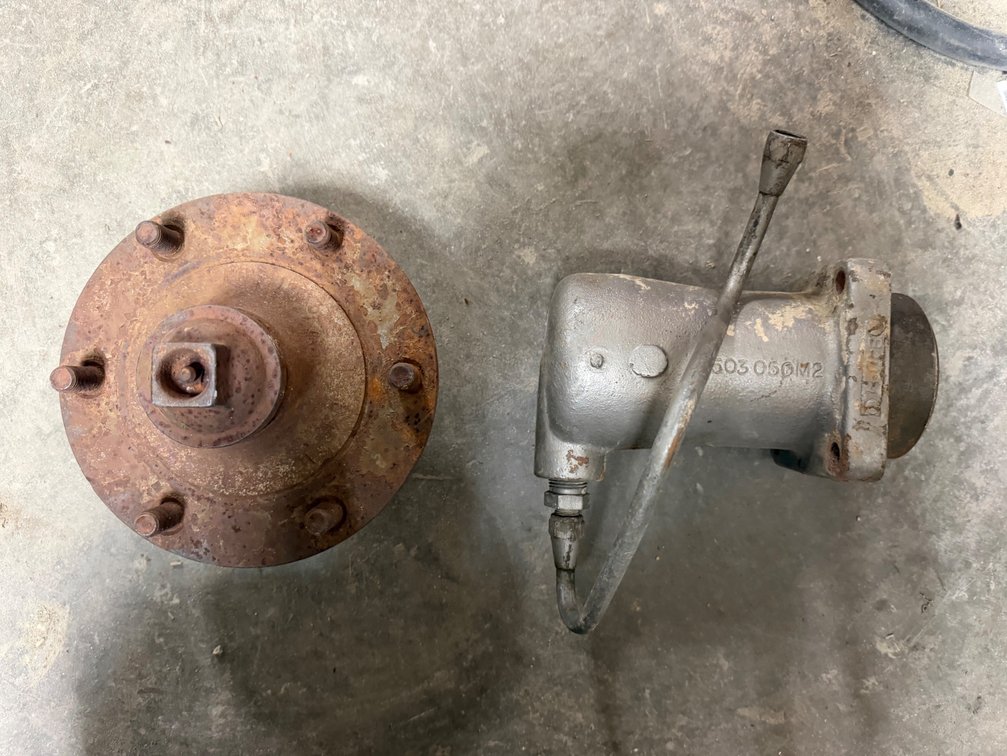 Original Massey Ferguson 1130 Tractor Power Steering Piston Housing and Massey Ferguson Tractor Wheel Hub for TE20, TEA20, TO20, TO30, TO35 -Item Location: Joel's Tractors and Auction, LLC-33587 Hwy. 13 -Strawberry Point - IA - 52076