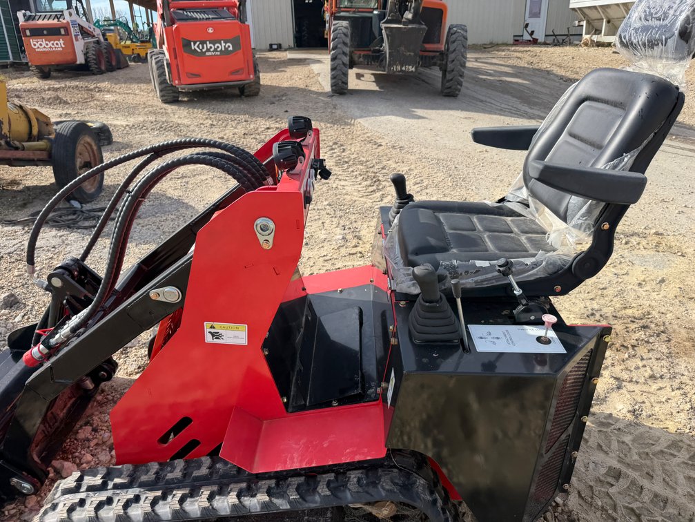SDLanch Sit on Self Mini Skid Loader - Item Location: Joel's Tractors and Auction – 33587 Highway 13, Strawberry Point, Iowa 52076