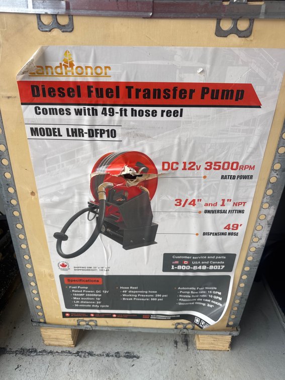 New diesel fuel transfer pump with 49 foot of hose and reel